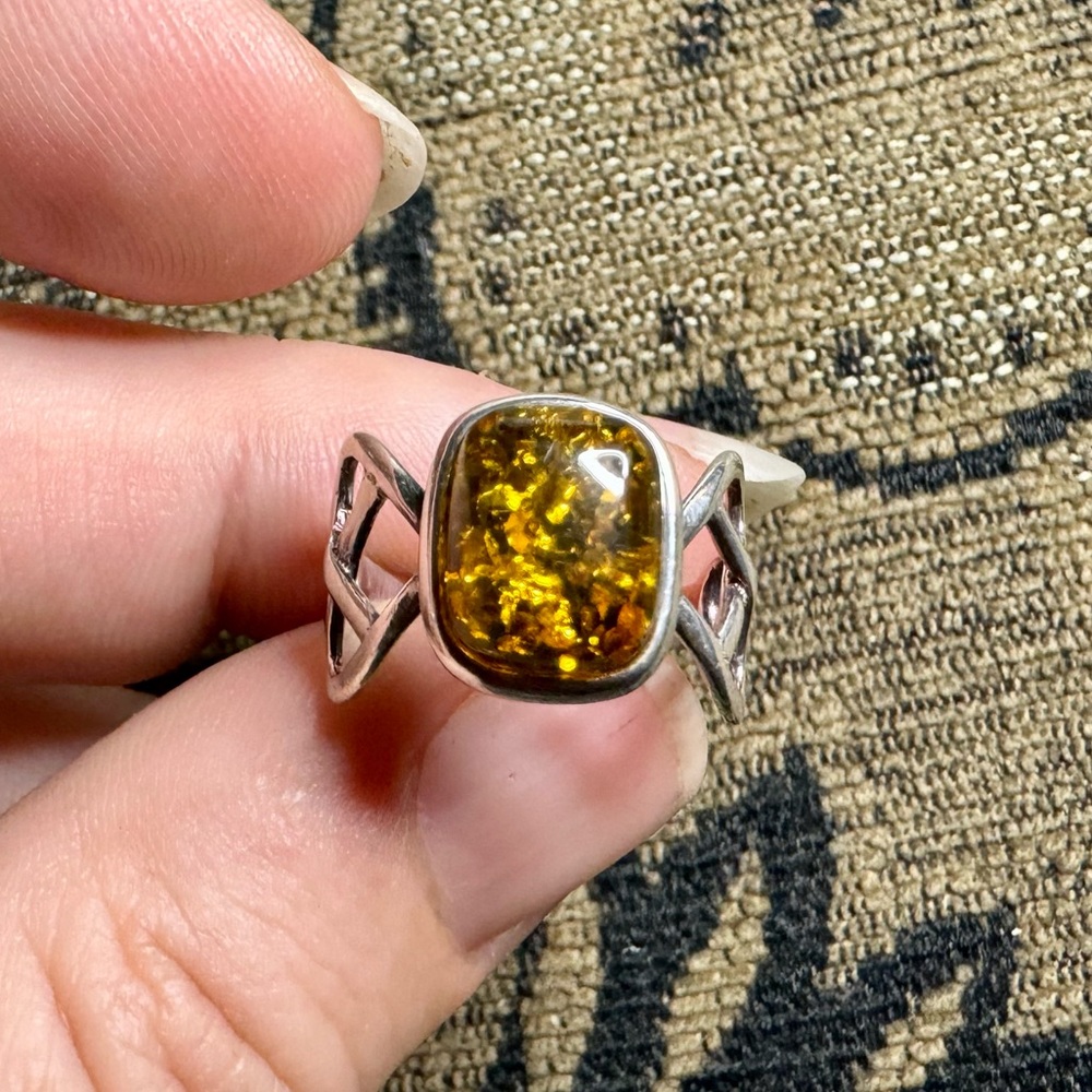 Silver and amber ring.
